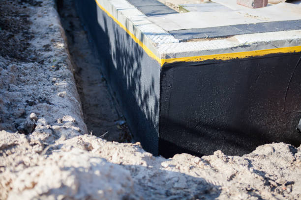 Professional Waterproofing technician working in Abingdon, IL